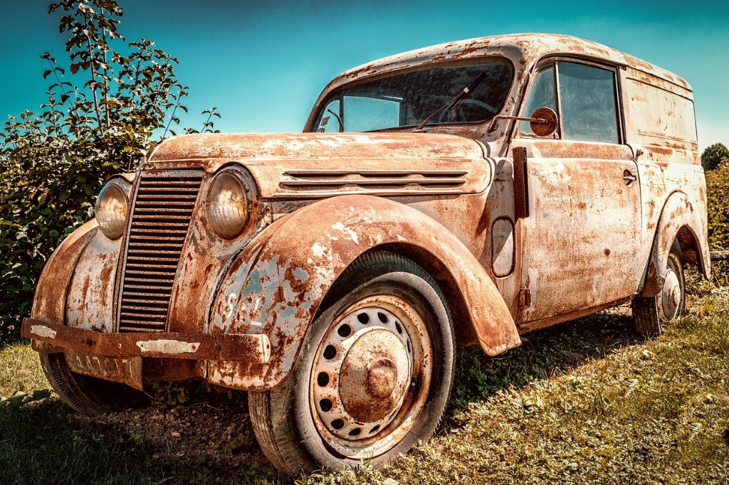 Old truck needing restoration from auto body shop